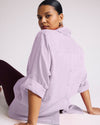 Woman wearing Button Back Linen Polo Shirt - Orchid from Universal Standard