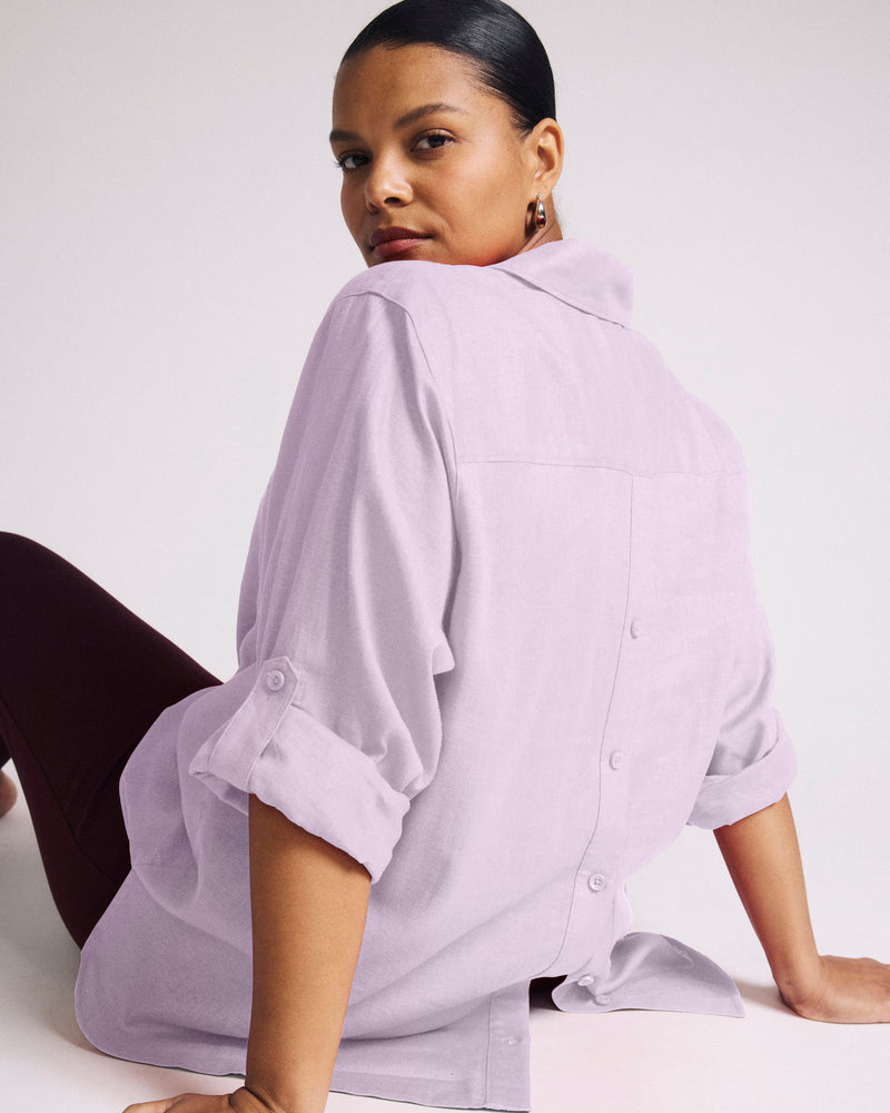 Woman wearing Button Back Linen Polo Shirt - Orchid from Universal Standard