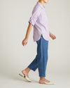 Woman wearing Button Back Linen Polo Shirt - Orchid from Universal Standard