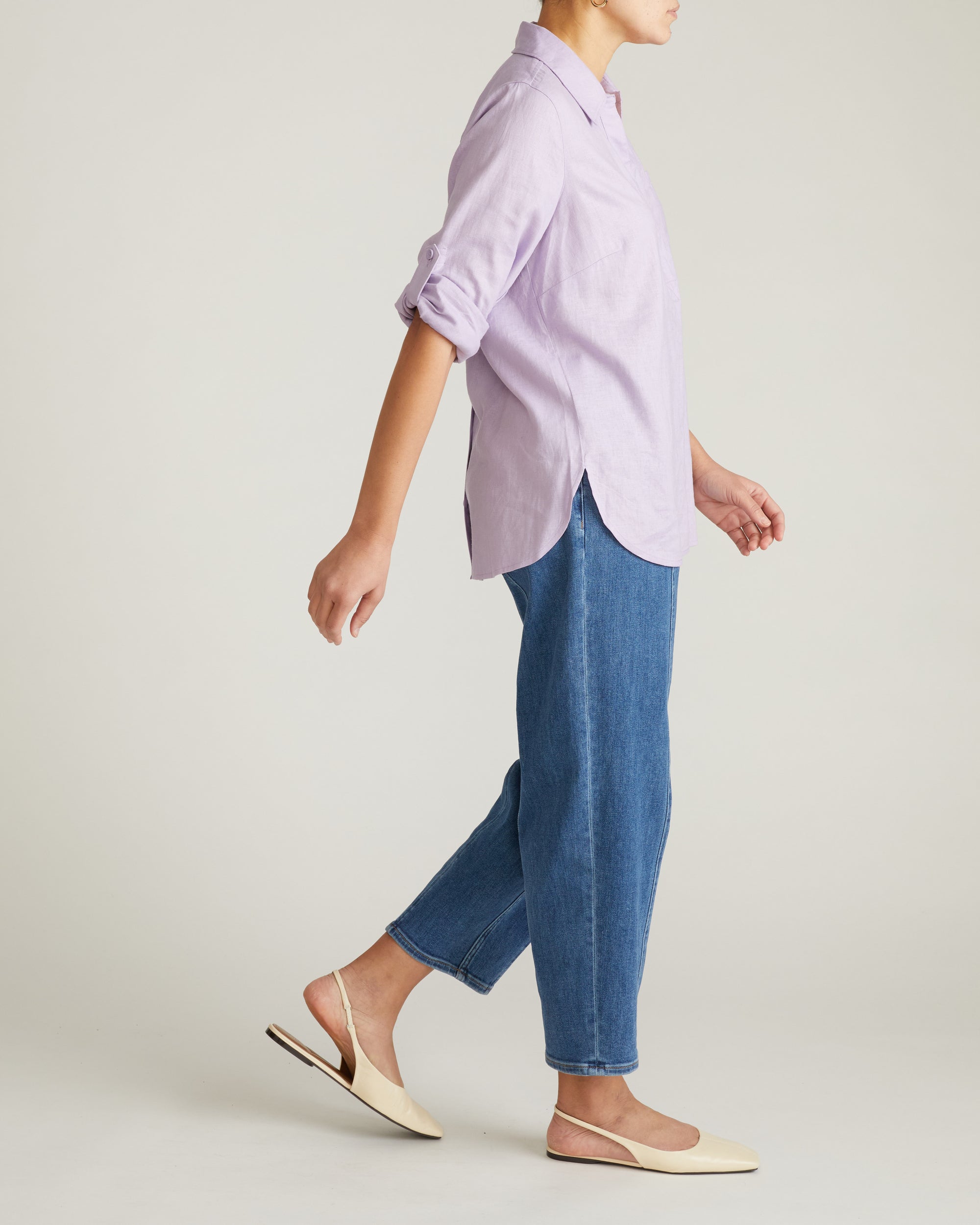 Woman wearing Button Back Linen Polo Shirt - Orchid from Universal Standard