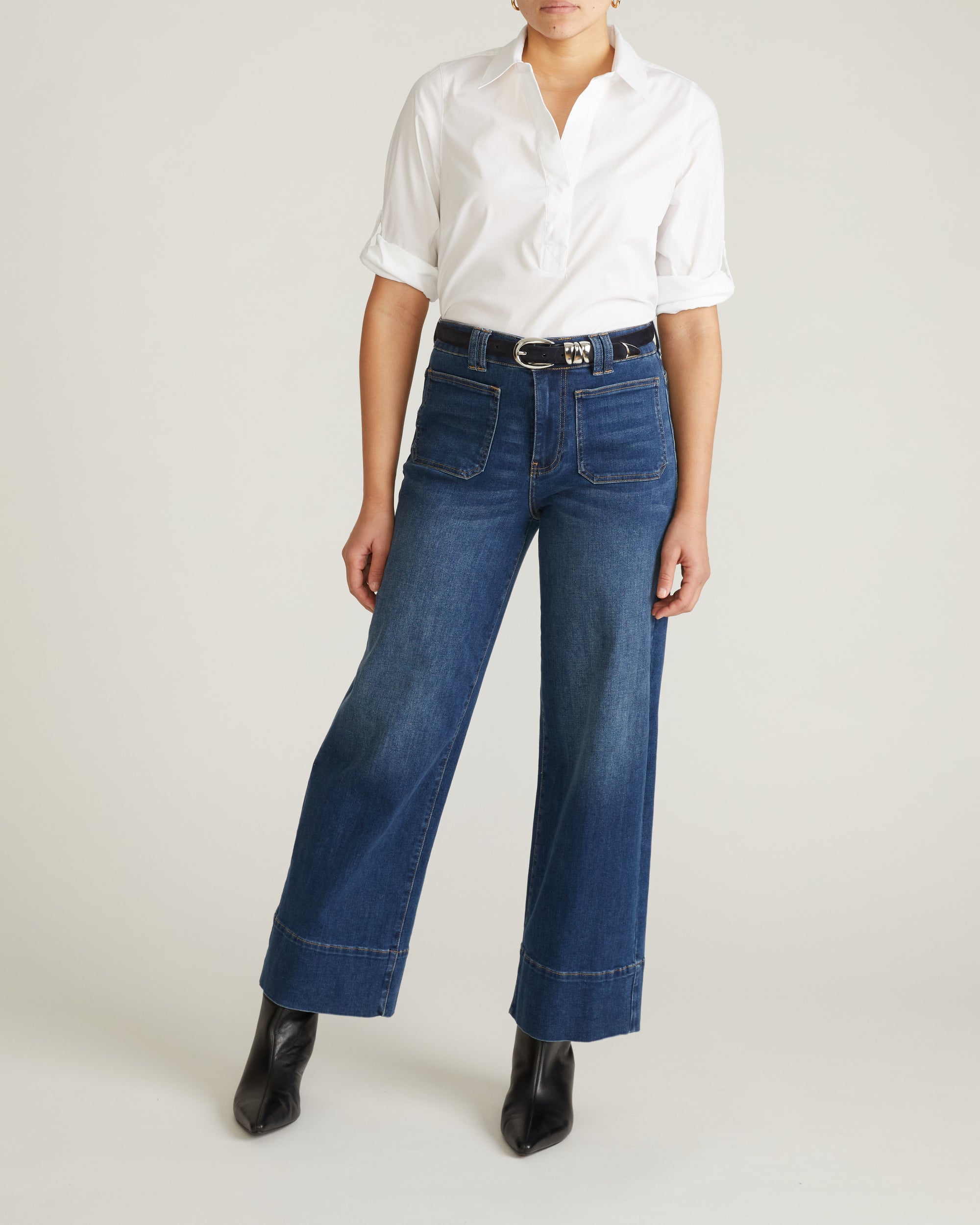 Woman wearing Button Back Poplin Polo Shirt - White from Universal Standard