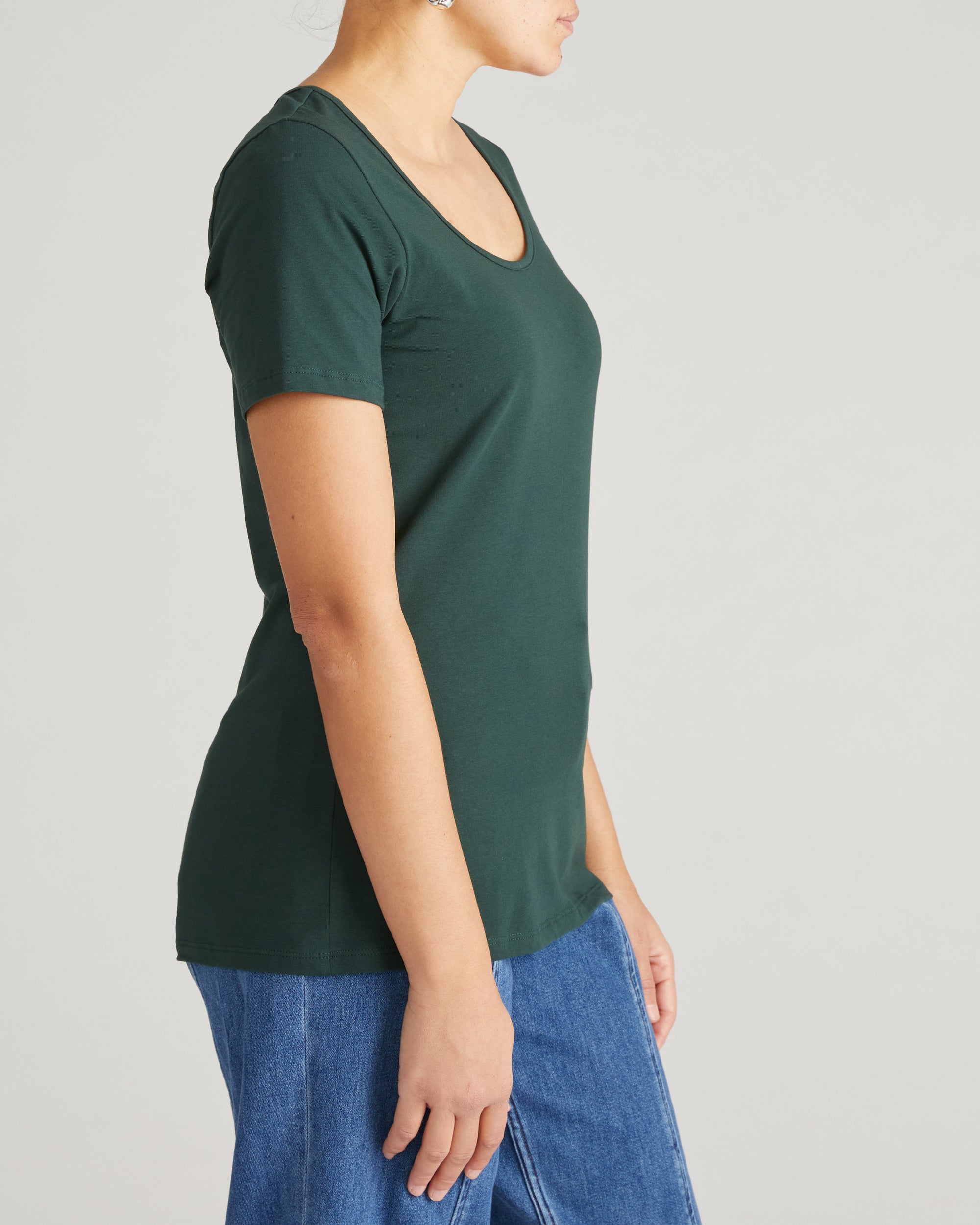 Woman wearing Scoop Neck Tee - Forest Green from Universal Standard