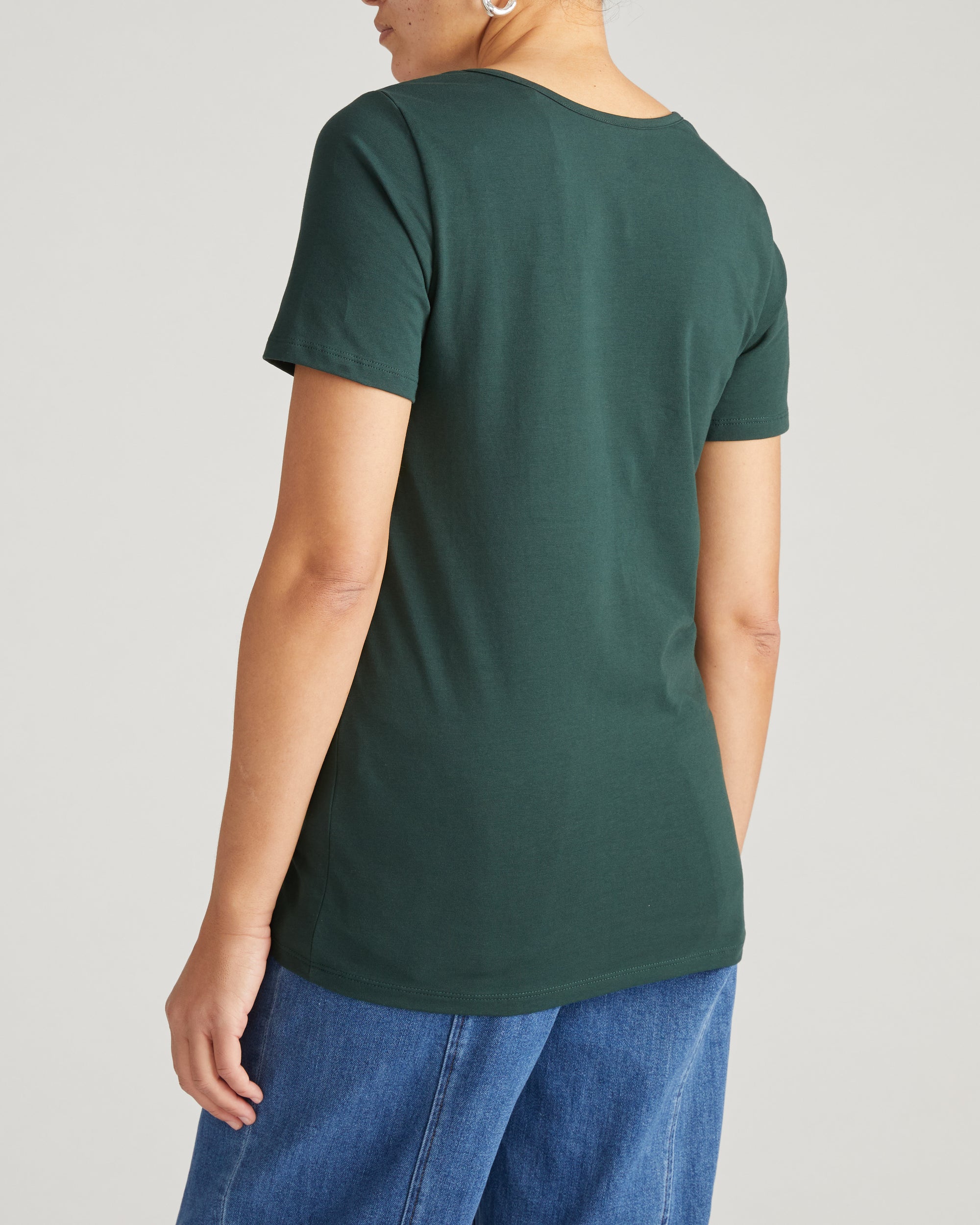 Woman wearing Scoop Neck Tee - Forest Green from Universal Standard