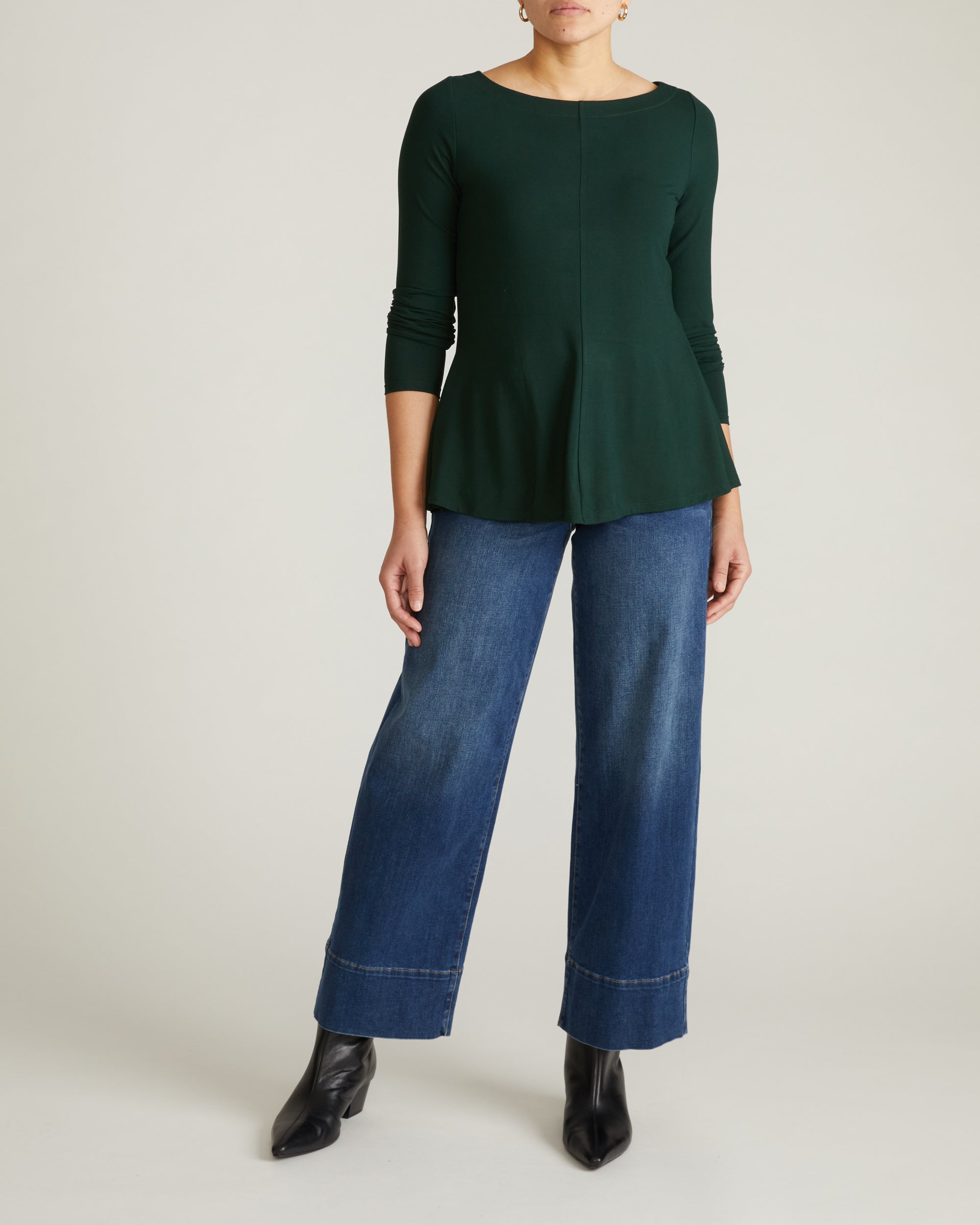 Woman wearing Cassandra Divine Jersey Top - Forest Green from Universal Standard