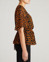 Milou V-Neck Peplum Chiffon Top - Black/Orange Dot Print
