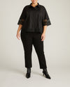 Woman wearing Dora Cotton Poplin Blouse - Black from Universal Standard