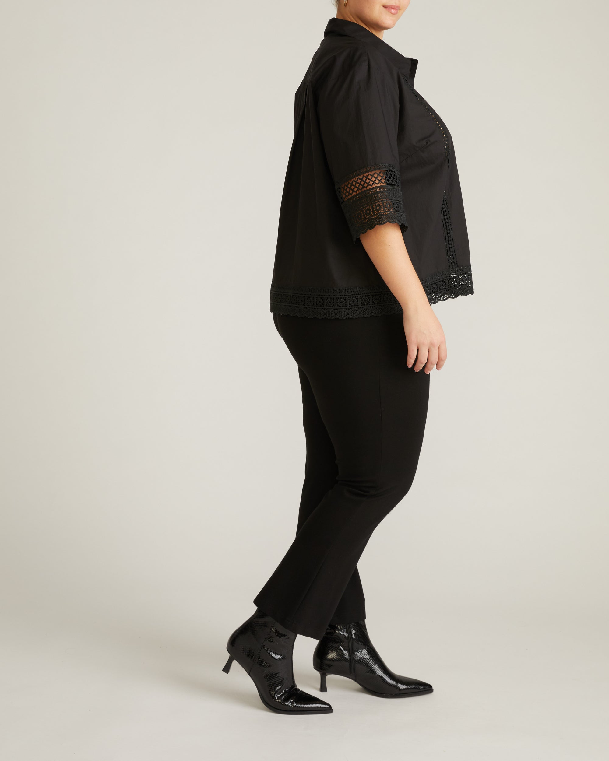 Woman wearing Dora Cotton Poplin Blouse - Black from Universal Standard