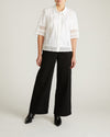 Woman wearing Dora Cotton Poplin Blouse - White from Universal Standard