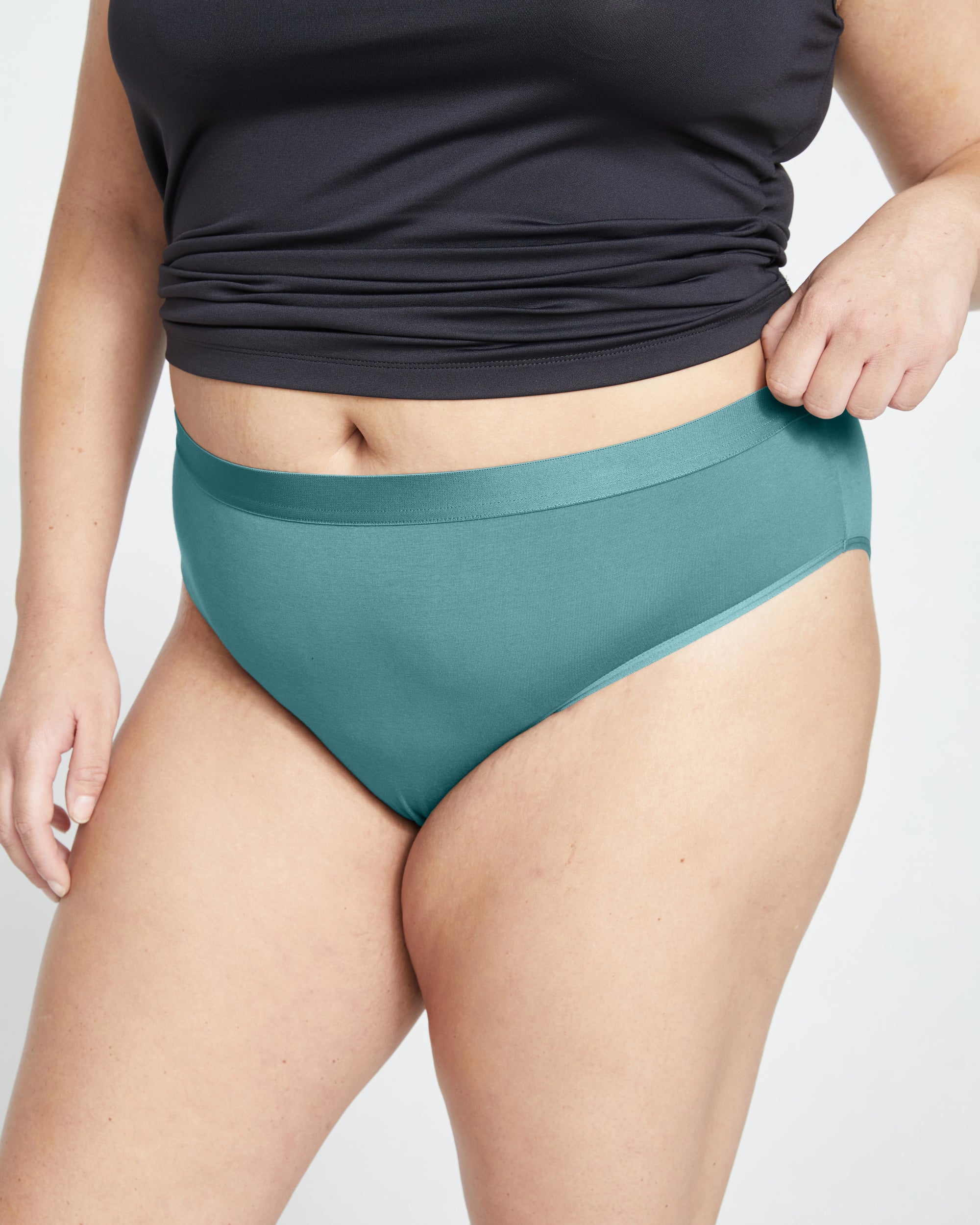 Woman wearing UltimateS Mid Rise Bikini - Libertas from Universal Standard