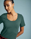 Woman wearing Scoop Neck Tee - Forest Green from Universal Standard