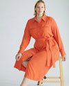 Woman wearing Cooling Stretch Cupro Savannah Dress - Orange Flame from Universal Standard