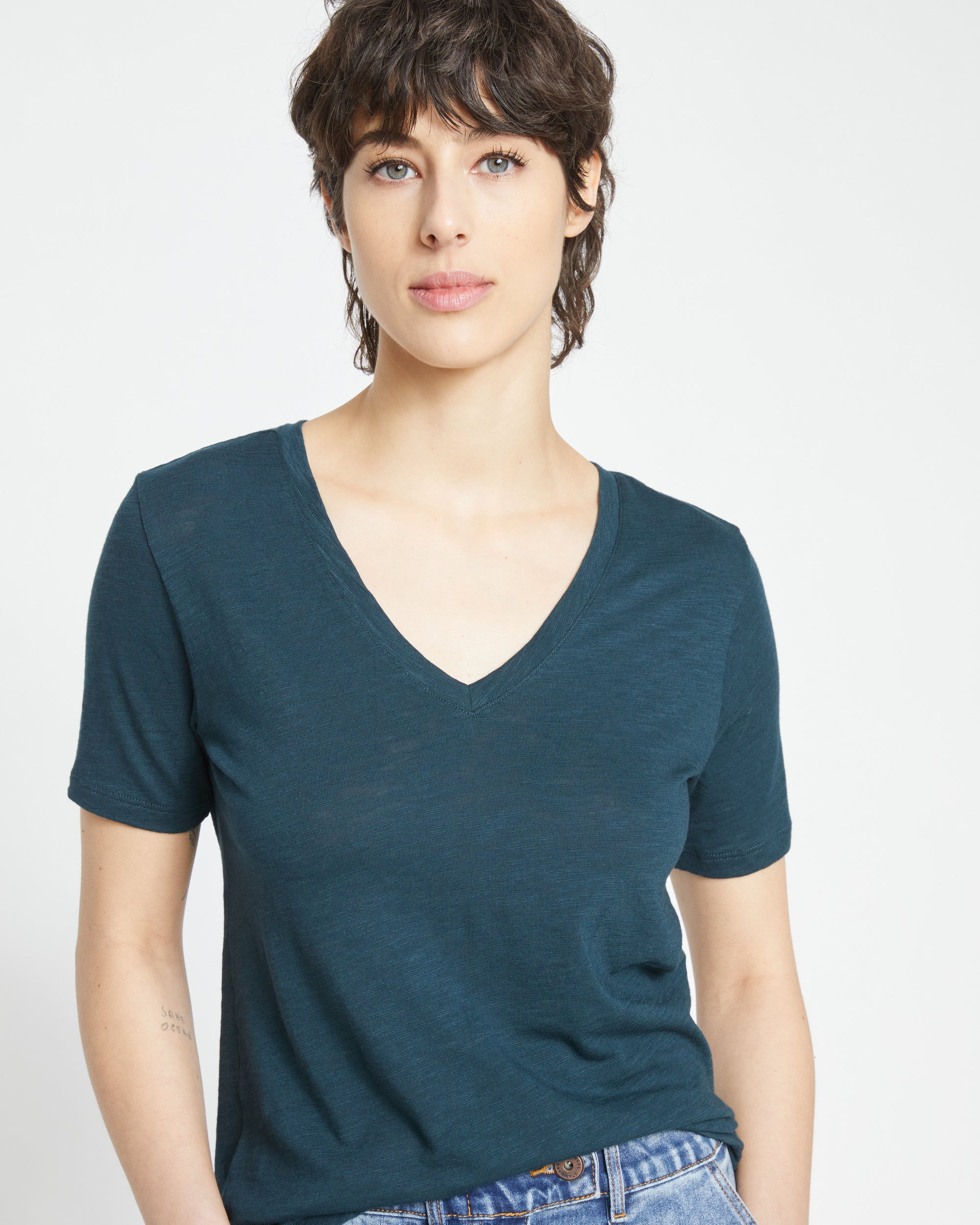 Woman wearing Light-As-Air V Rex - Deep Sea from Universal Standard