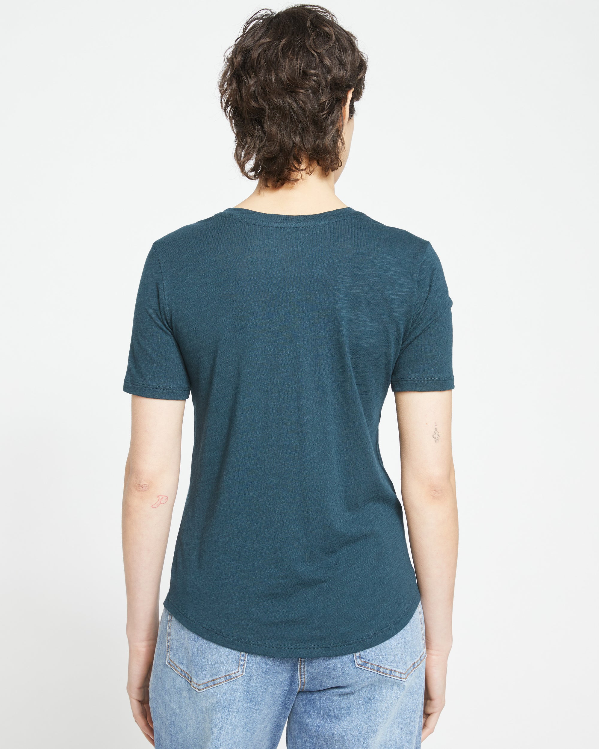 Woman wearing Light-As-Air V Rex - Deep Sea from Universal Standard