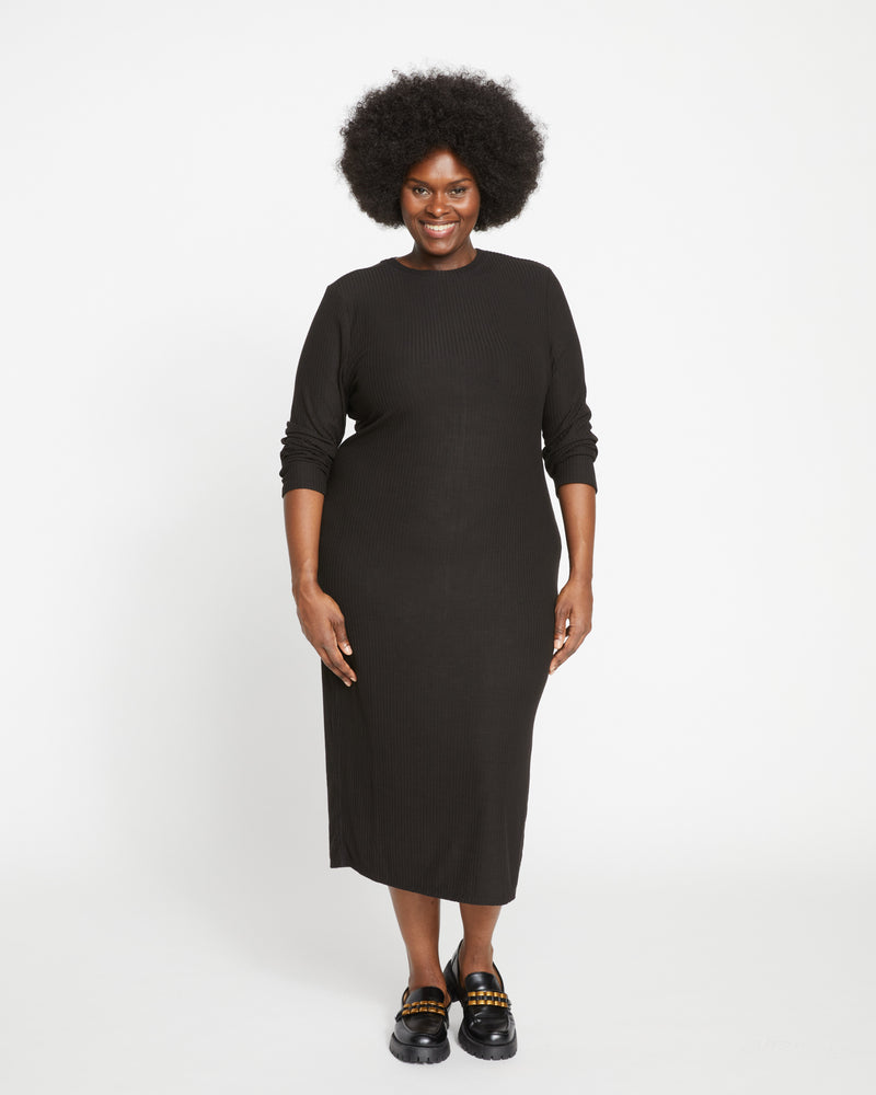 Woman wearing Xenia Ribbed Dress - Black from Universal Standard