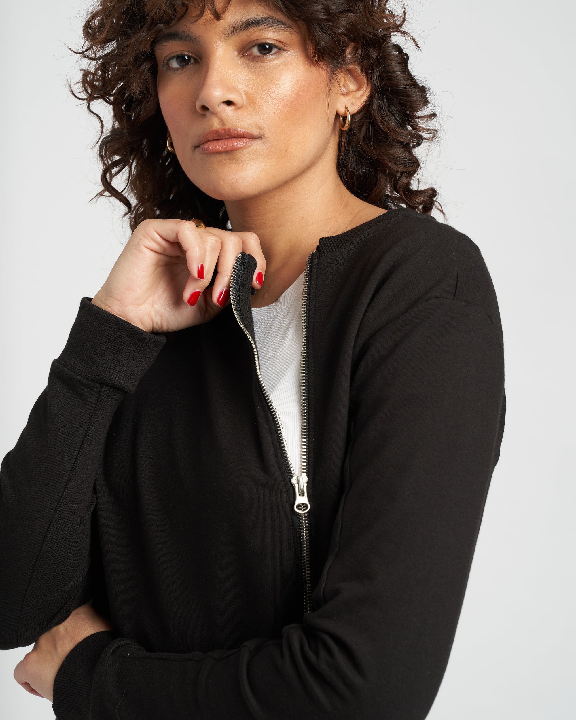 Woman wearing Meridien Zip Sweatshirt - Black from Universal Standard