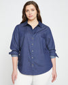 Woman wearing Minimalist Stretch Cotton Chambray Shirt - Dark Indigo from Universal Standard