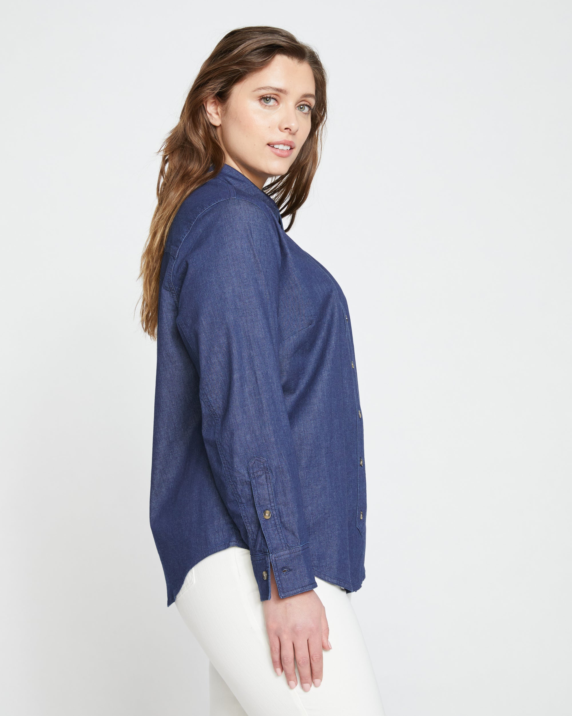 Woman wearing Minimalist Stretch Cotton Chambray Shirt - Dark Indigo from Universal Standard
