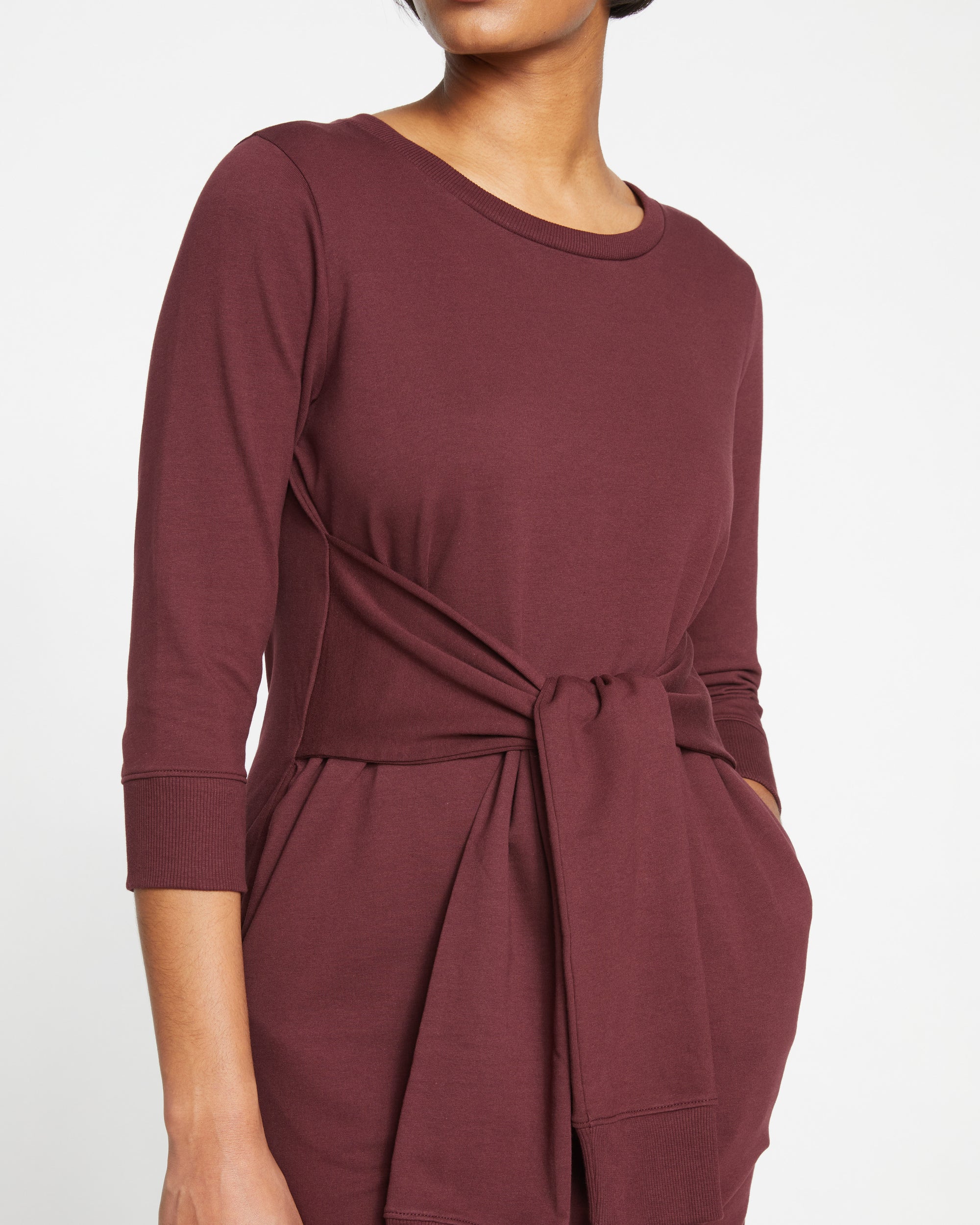 Woman wearing Misa Tie Sweatshirt Dress - Black Cherry from Universal Standard