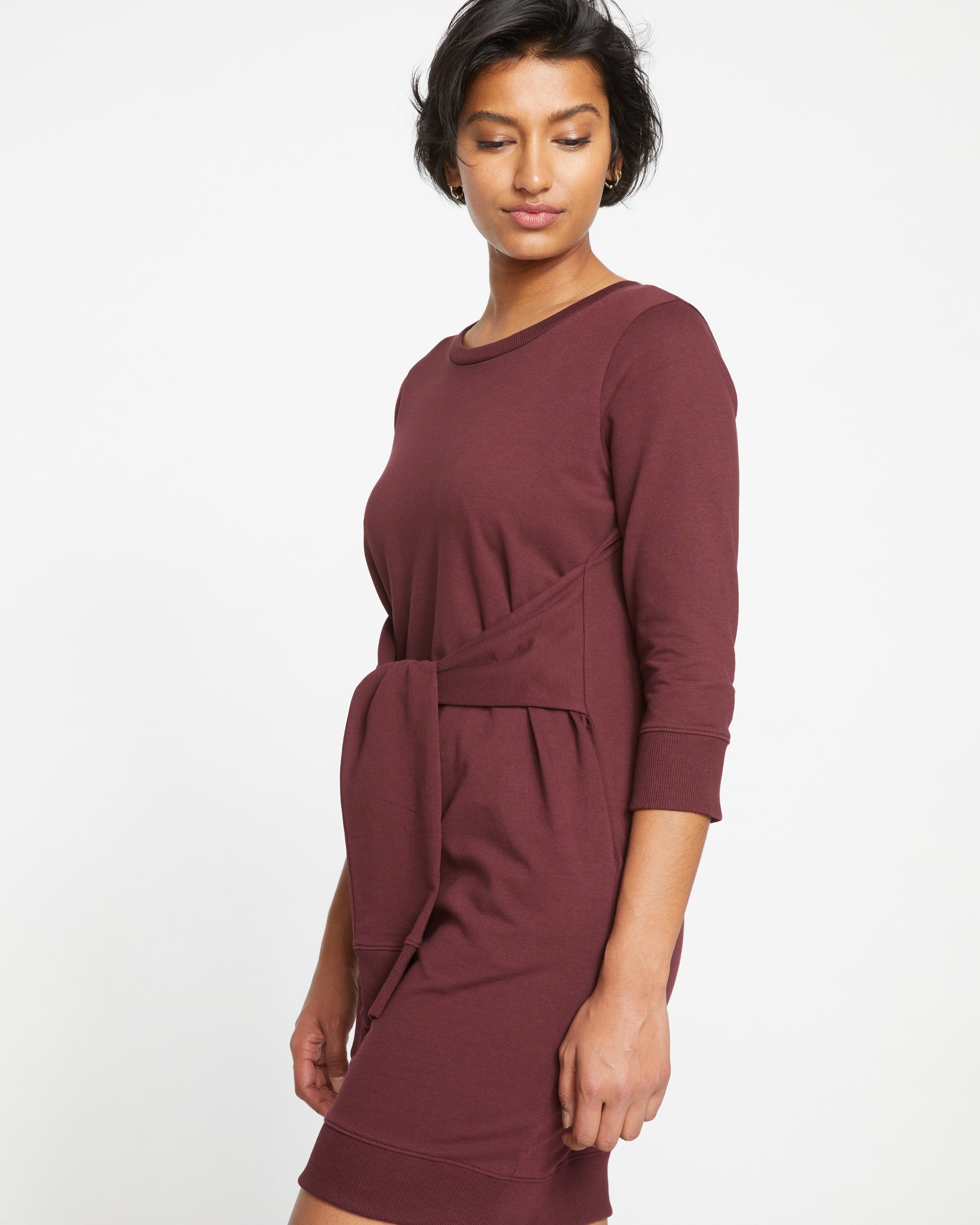 Woman wearing Misa Tie Sweatshirt Dress - Black Cherry from Universal Standard