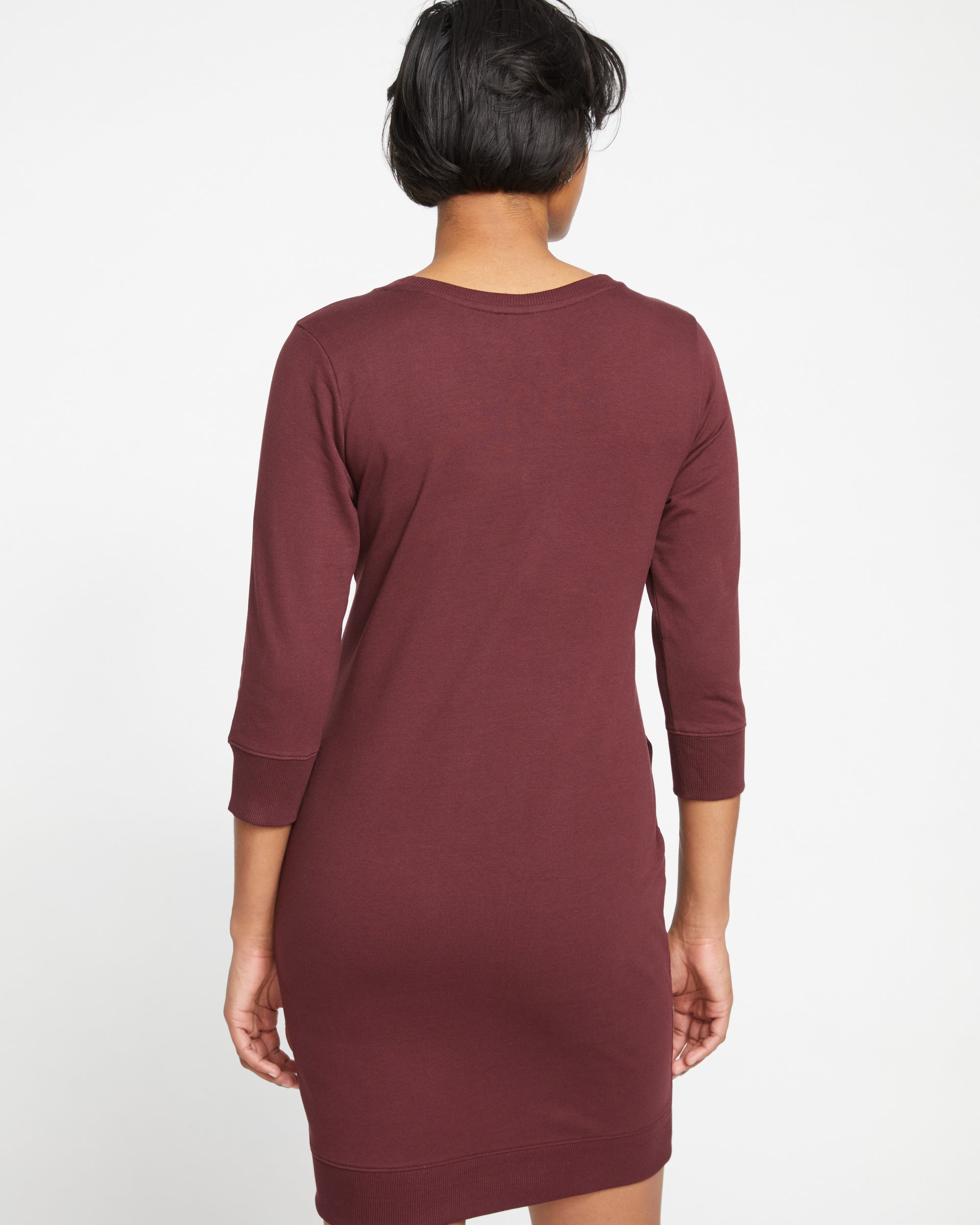 Woman wearing Misa Tie Sweatshirt Dress - Black Cherry from Universal Standard
